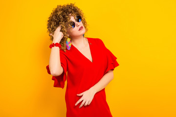 Attractive woman with short curly hair