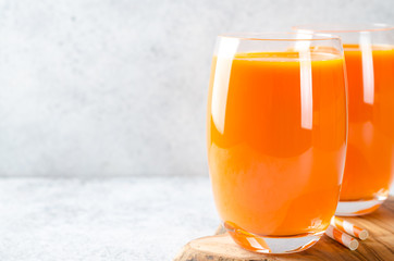 Two glasses of carrot juice