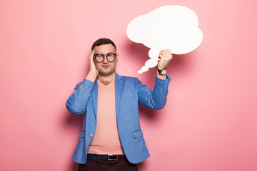 Handsome man in bright jacket with speech bubble