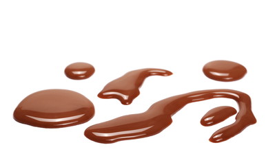 Spilled chocolate milk puddle isolated on white background