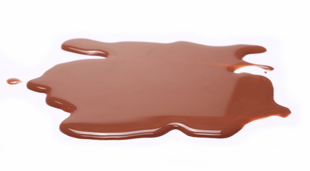Spilled chocolate milk puddle isolated on white background