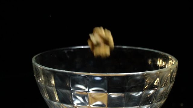 Full bowl of walnuts, slow motion