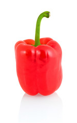 Sweet red bell pepper with green stem isolated on white background with shadow reflection. Red sweet pepper.
