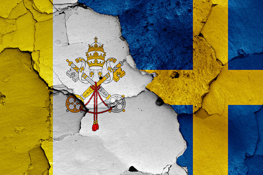 flag of Vatican and Sweden painted on cracked wall