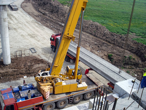 Truck transporting beams concrete