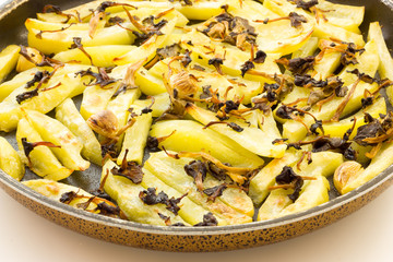 Tasty appetizer of baked potatoes with mushrooms