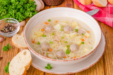 Chicken soup with meatballs and noodles