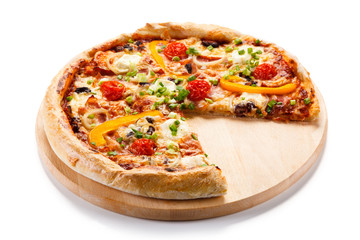 Pizza with ham and vegetables on white background 