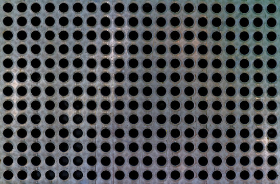 Old metal plate texture background, Auminum checker board with black holes