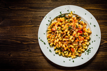 Pasta with meat, tomato sauce and vegetables