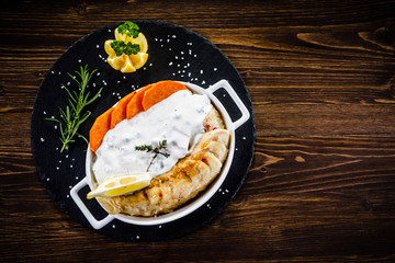 Fish dish - fried fish fillet with vegetables 