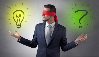 Businessman with idea versus question concept