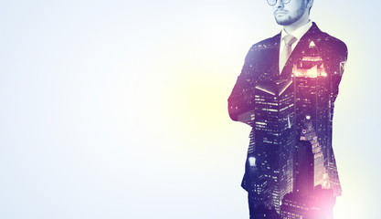 Young man thinking with city wallpaper