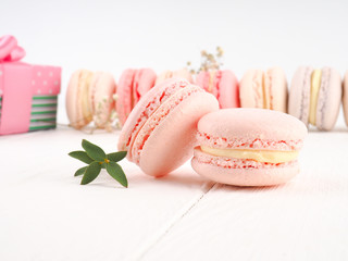 Colorful macaroons, Colorful french dessert, traditional french colorful macarons in a rows in a box