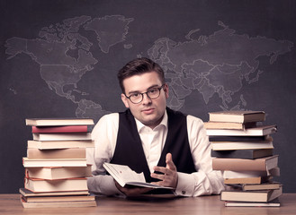 Geography teacher at desk