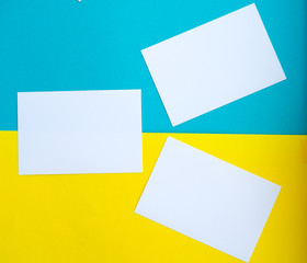 forms white to yellow and blue background, bright colours, empty space for text