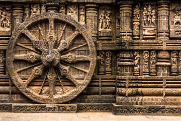Fototapeta na wymiar Carved chariot wheel on Konark Sun Temple, Odisha, India