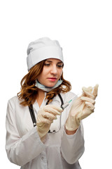 young girl nurse in glasses prepares syringe