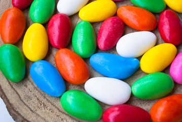 Easter background with colorful candy eggs