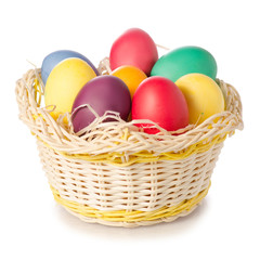 Fototapeta na wymiar Easter color eggs in the basket
