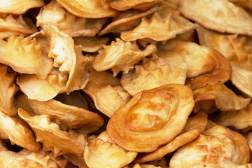 Appetizing small oscypek (sheep cheese) in a street stall