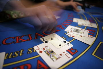 Card deler blured hand casino