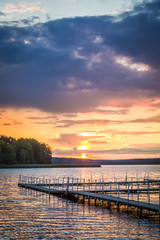 Fototapeta na wymiar Dynamic sky at the lake in sunset, Poland