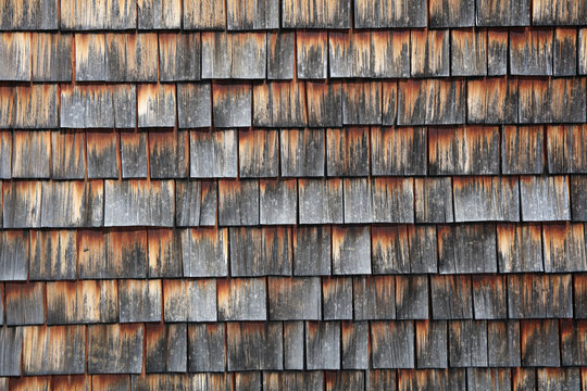 Abstract wooden texture of cedar shingles in Austria