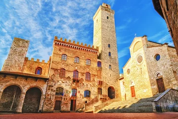 Rolgordijnen Picturesque View of famous Piazza del Duomo in San Gimignano at sunset, Tuscany, Italy © Feel good studio