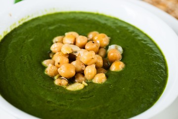 Mixed fresh spring spinach with chickpeas and herb.