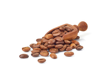 Shovel with roasted coffee beans on white