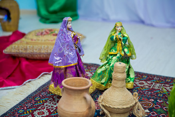 Azerbaijan national women's puppet wear. Ancient Azerbaijan military sword . Azerbaijani national costume