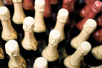 Many bottles of champagne on the shelves of the store