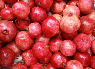 Group of pomegranates. Pomegranate closeup, background