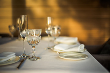 Empty glasses on a background of green grass.