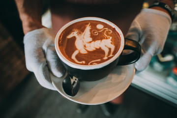 coffee latte art espresso in coffee shop vintage color tone