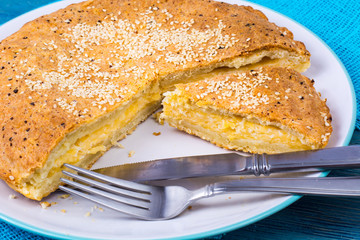 Homemade cake with cheese and sesame seeds