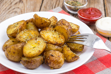 Slices of potato-grilled with rosemary