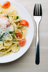 Traditional Apulia region pasta Orecchiette with turnip greens and parmezan, Concept Italian Pasta