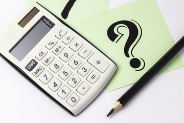 Close up of calculator, instrument of measurement and pencils