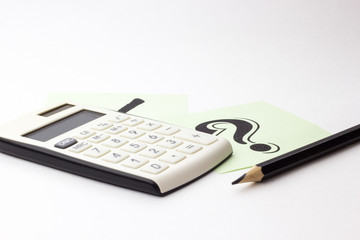 Close up of calculator, instrument of measurement and pencils