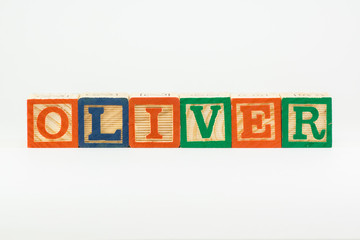 Oliver - common boy's name in wooden alphabet blocks
