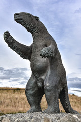 Fototapeta na wymiar A Milodon statue welcomes visitors to the town of Puerto Natales, Chile