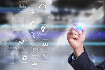 Business and technology concept. Graphs and icons on virtual screen.