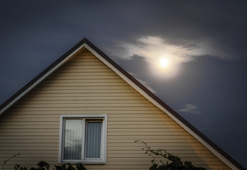 Skate house on background of the moon.