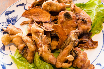 Tea fried chicken on table