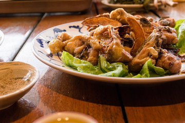 Tea fried chicken on table