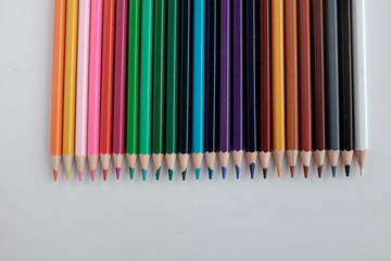 Colour pencils isolated on white background