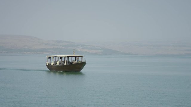 Boat floating on the Sea of Galilee
