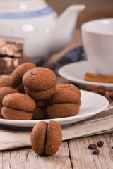 Hazelnut shortbread sandwiches filled with chocolate cream